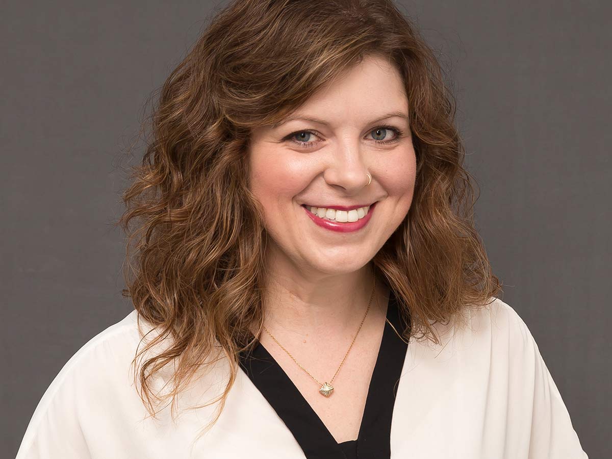 Jessica Miller smiling.