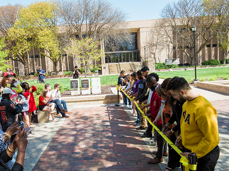 Ribbon-cutting ceremony for the Multicultural Greek Council Quad