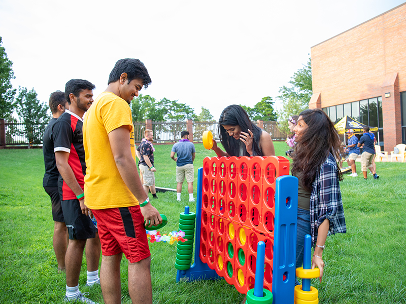 Students play giant connect four