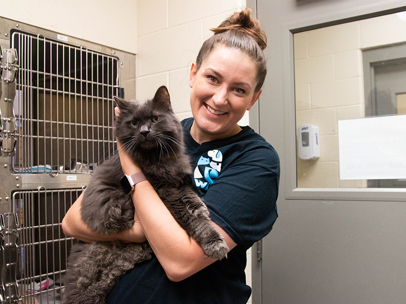 Sarah Coffman with a cat rescued by the Wichita Animal Shelter