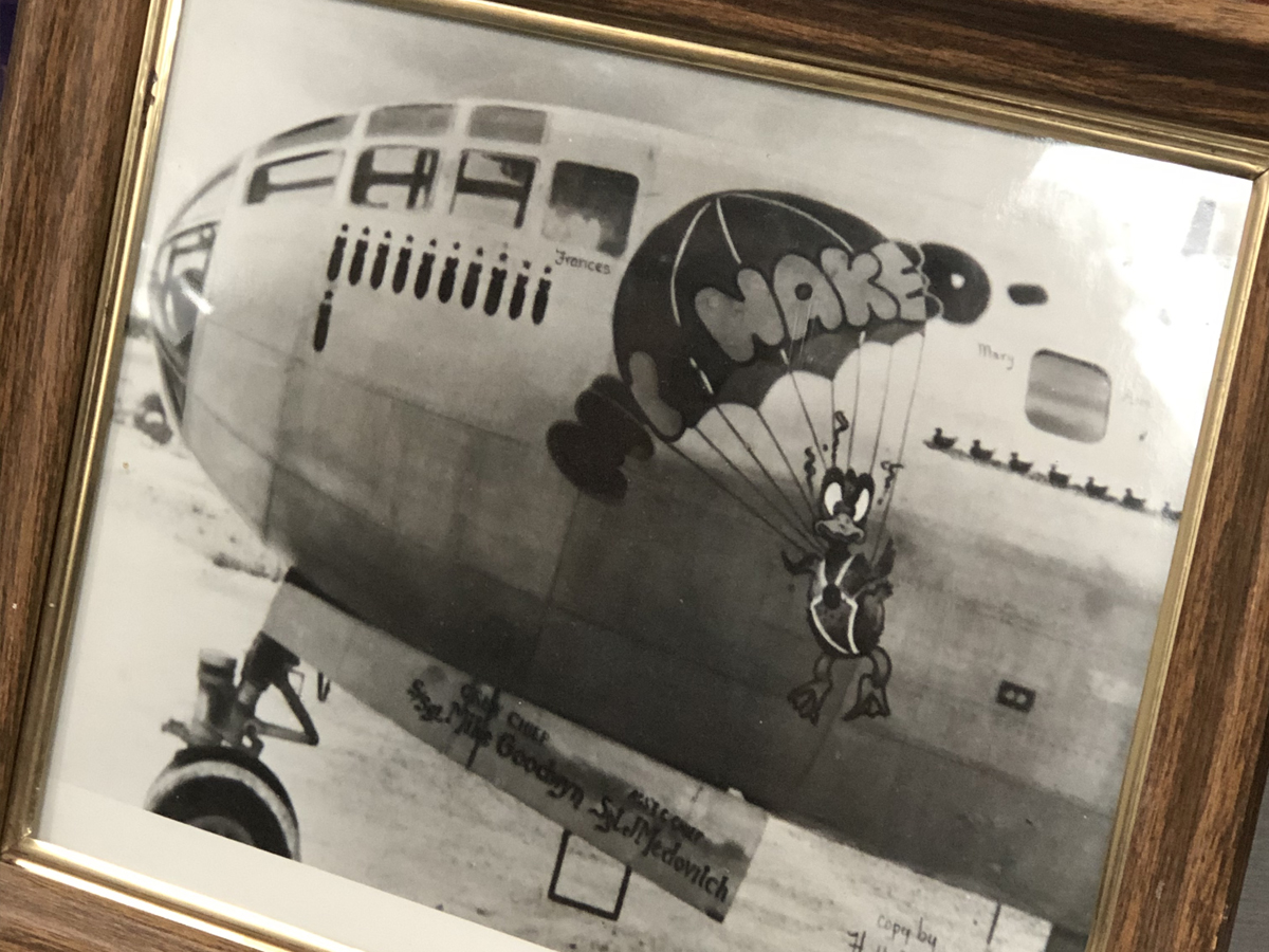 Martin's framed picture of his B-29B bomber, named "My Naked." "We were tired of half-naked women on airplanes, so we called ours, 'My Naked,'" Martin said.