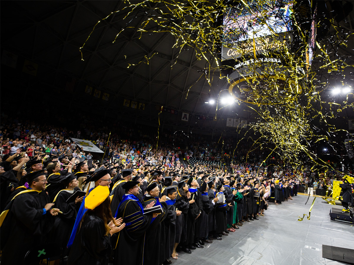 A photo of Morrison Hall in the 1940s, looking northeast. Note the new trees and numerous shrubs around the base of the building.