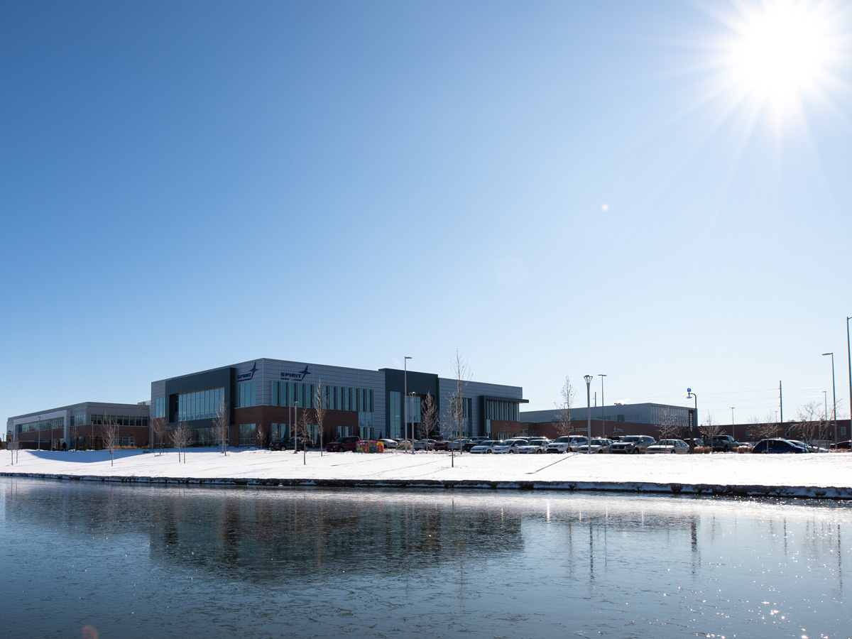 A view of Spirit Aerosystems, Airbus and Dassault Systemes over the Plaza Pond.