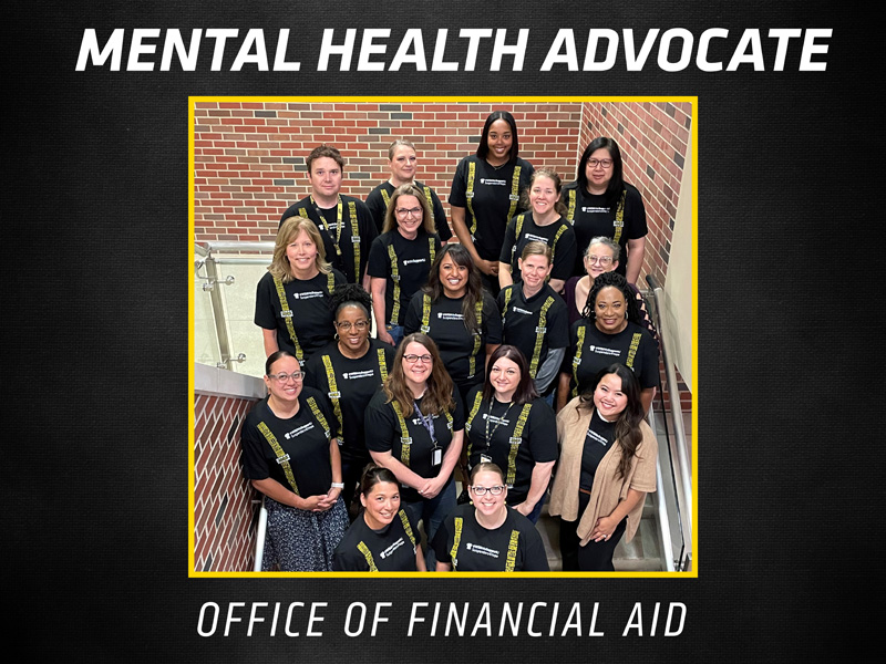 The Office of Financial Aid pose in their Suspenders4Hope T-shirts