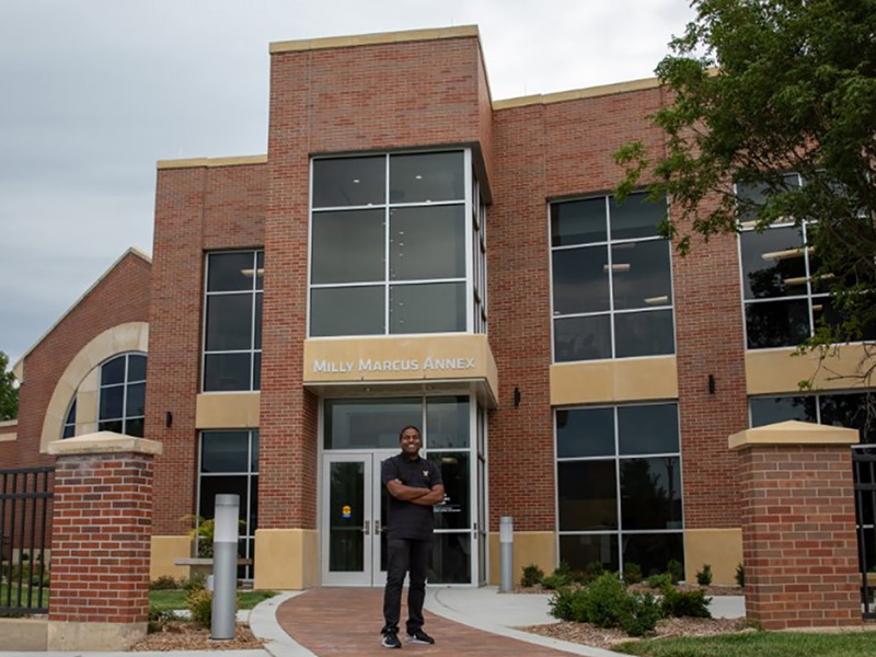 Bobby Gandu stands in front of the Milly Marcus Annex.