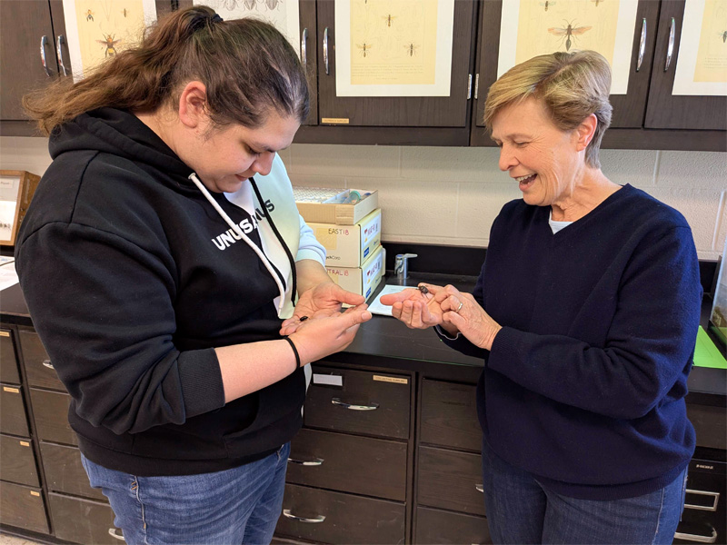 Mary Liz Jameson with a student