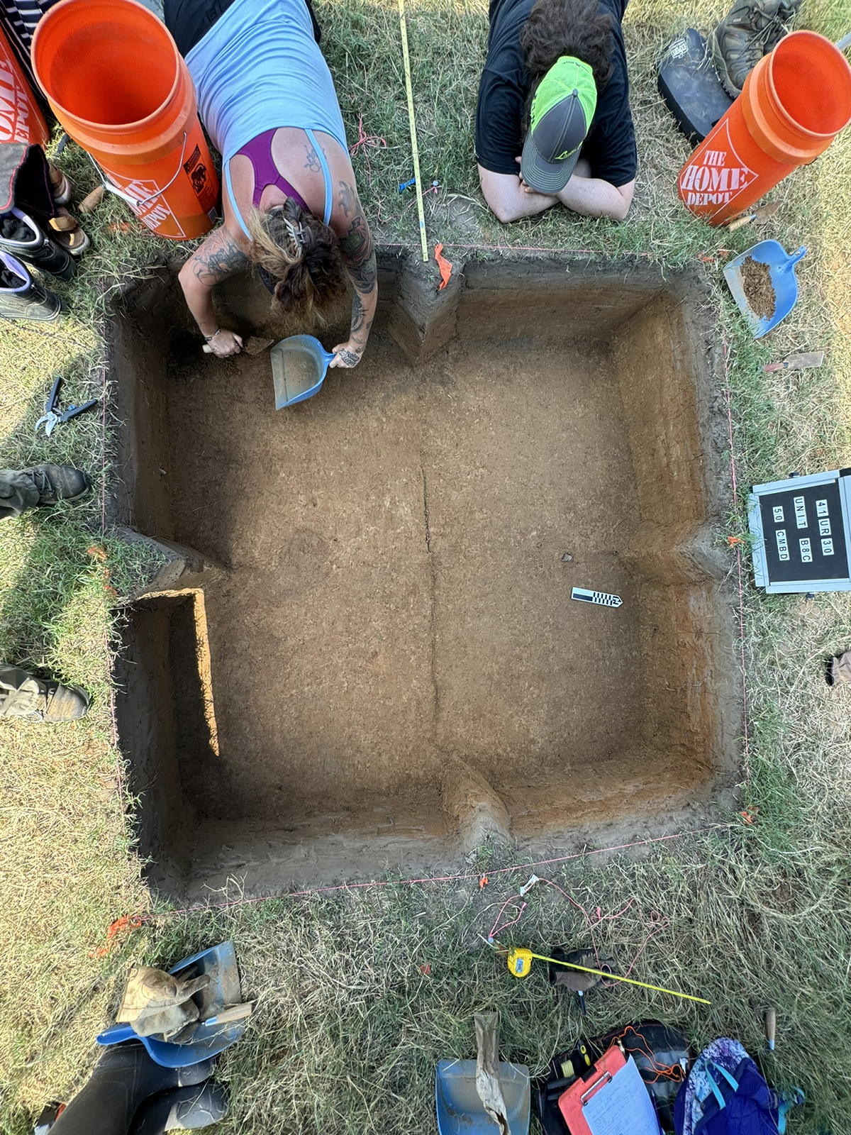Two students on an archeology dig