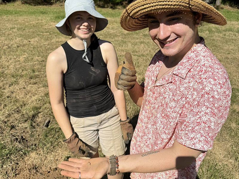 Two students on an archeology dig