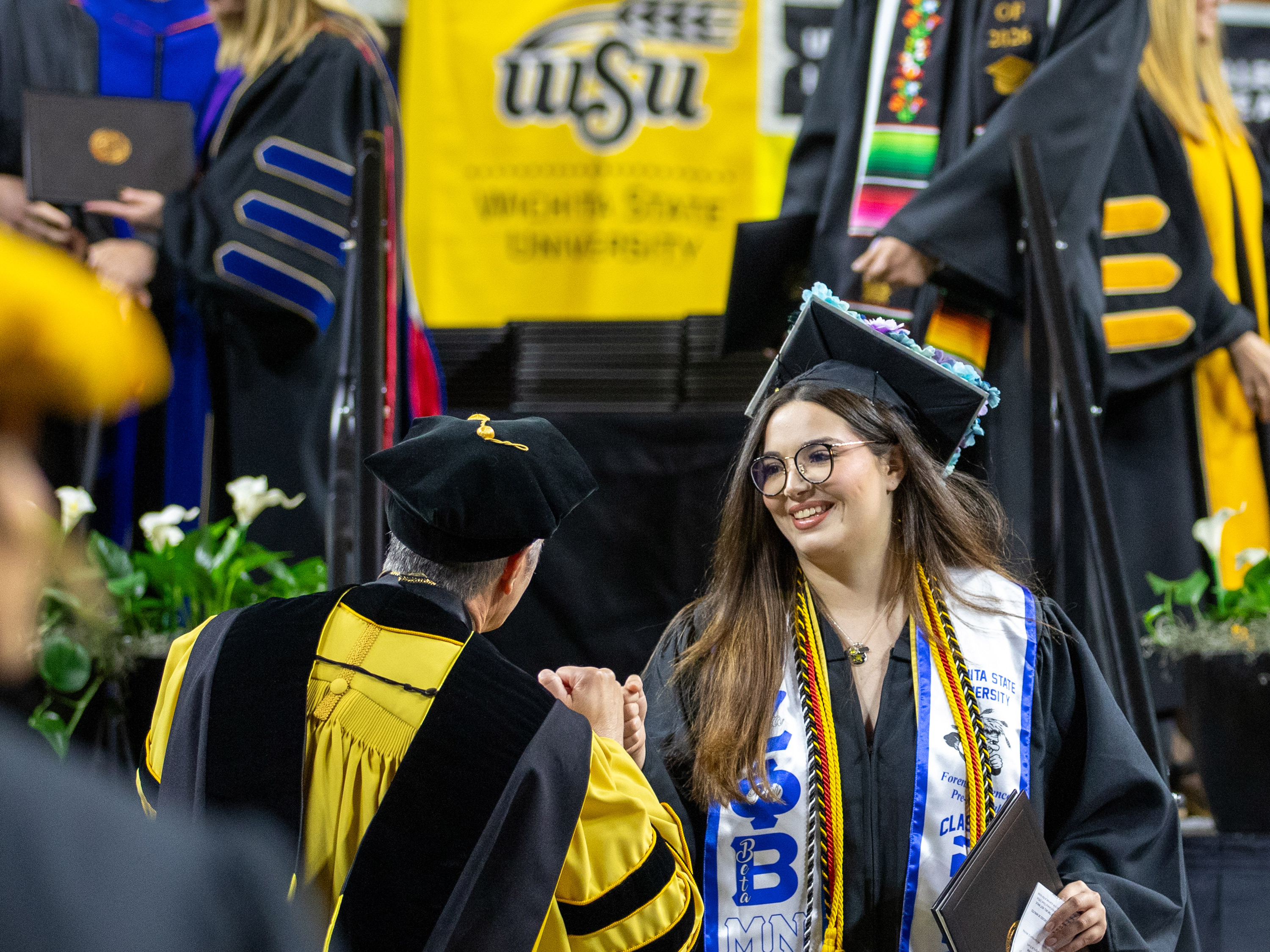 Graduate at Commencement
