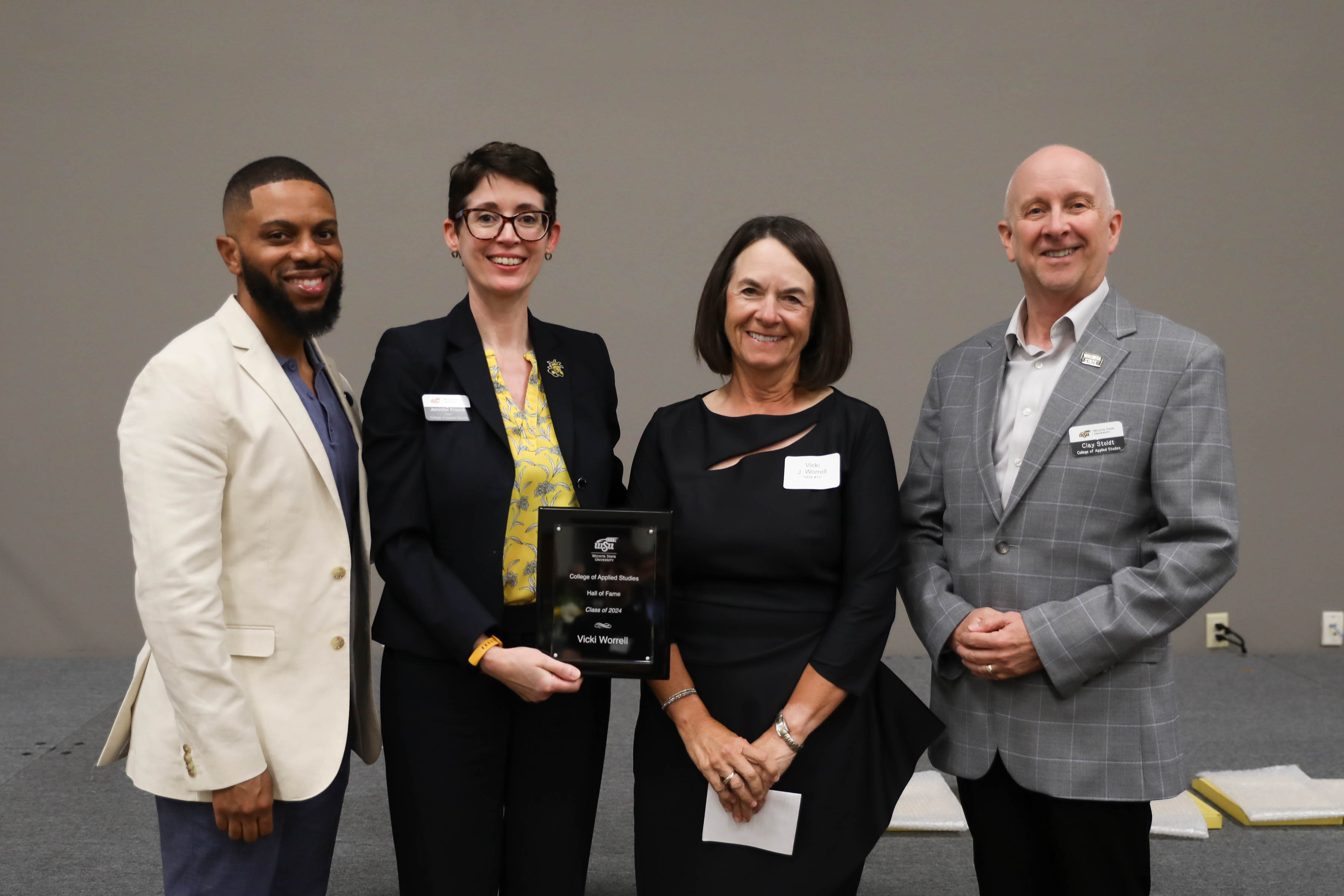 2024 CAS Hall of Fame Inductee, Dr. Vicki Worrell being recognized and receiving her award plaque alongside CAS Assistant Dean Dr. Bobby Berry, CAS Dean Dr. Jennifer Friend, and CAS Associate Dean, Dr. Clay Stoldt at the Hall of Fame Induction Ceremony