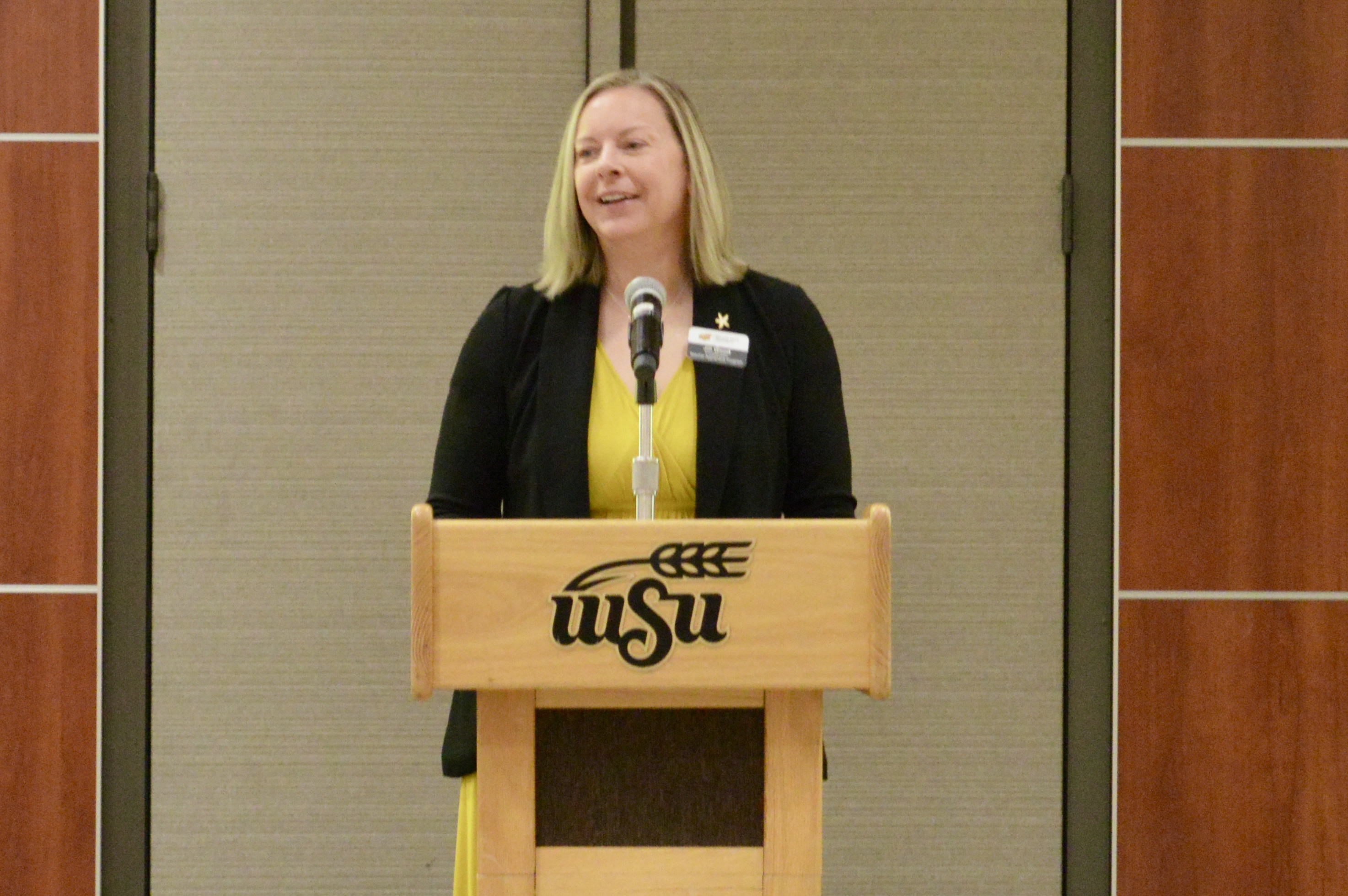 Jill speaking at TAP ceremony