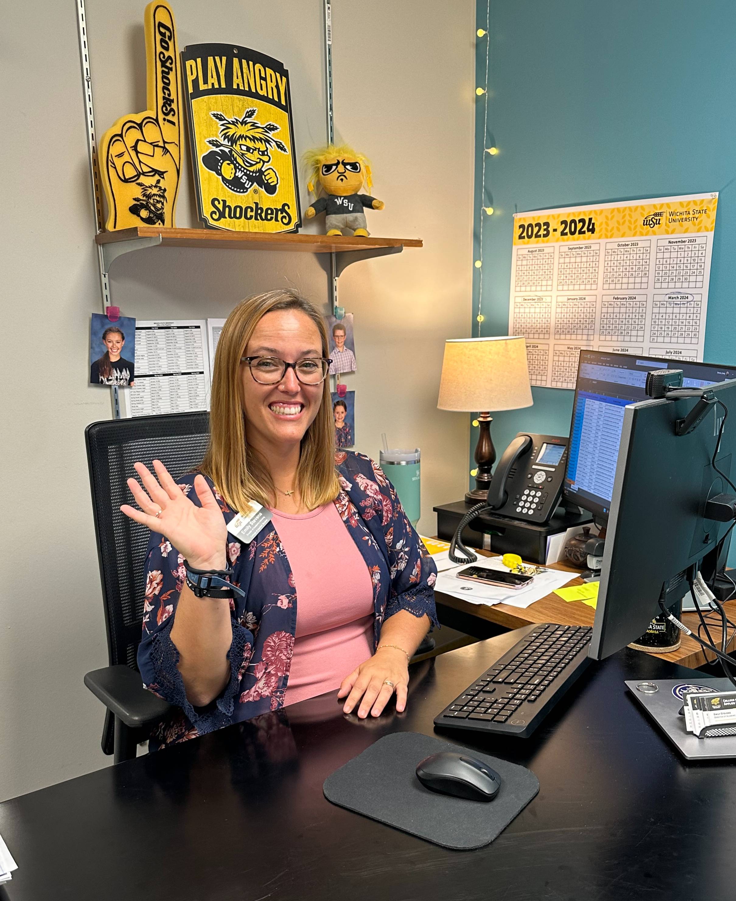 Emily Stevens welcoming students and staff into her office