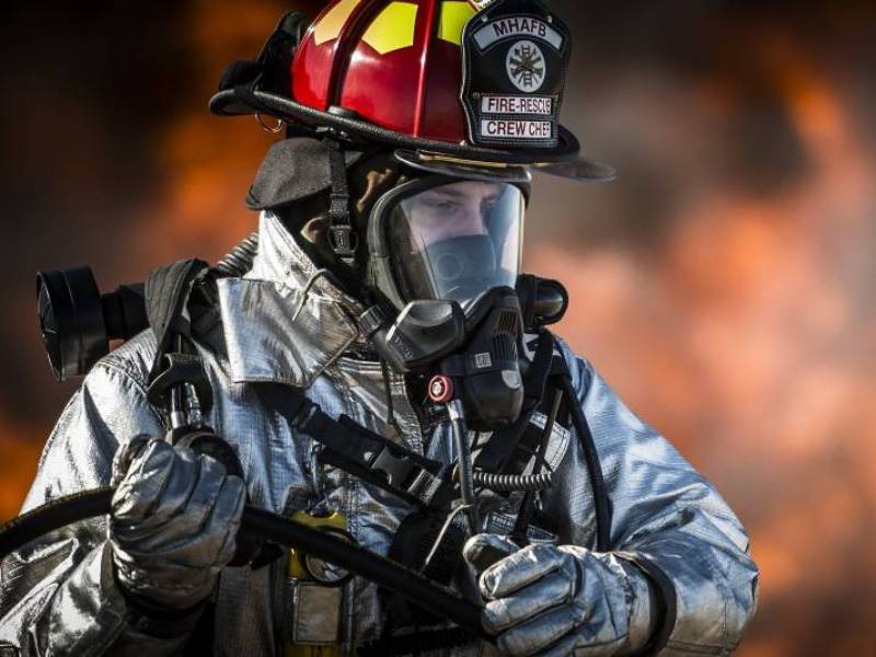 Emergency and Public Service thumbnail of firefighter with axe