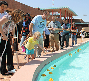 Photo of duck race participants.
