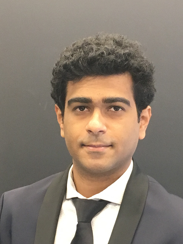 Manoj Krishnamaraja against a grey background.