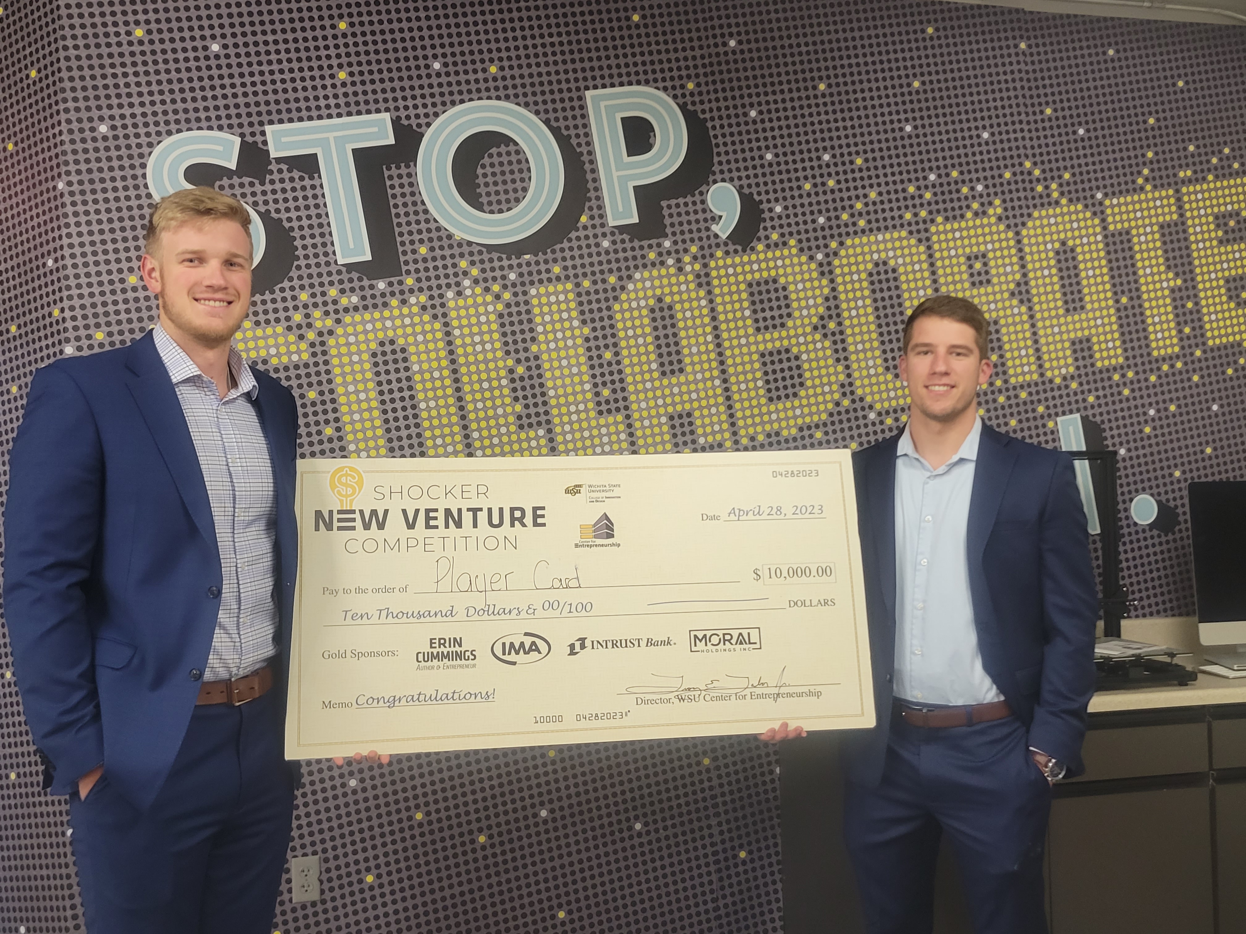 SNVC 2023 1st place winners, Player Card holding a giant $10,000 check.