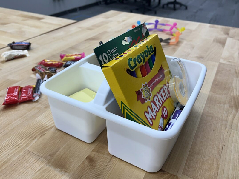Markers, candy, post-its, supplies in the College of Innovation and Design's Open XR Lab