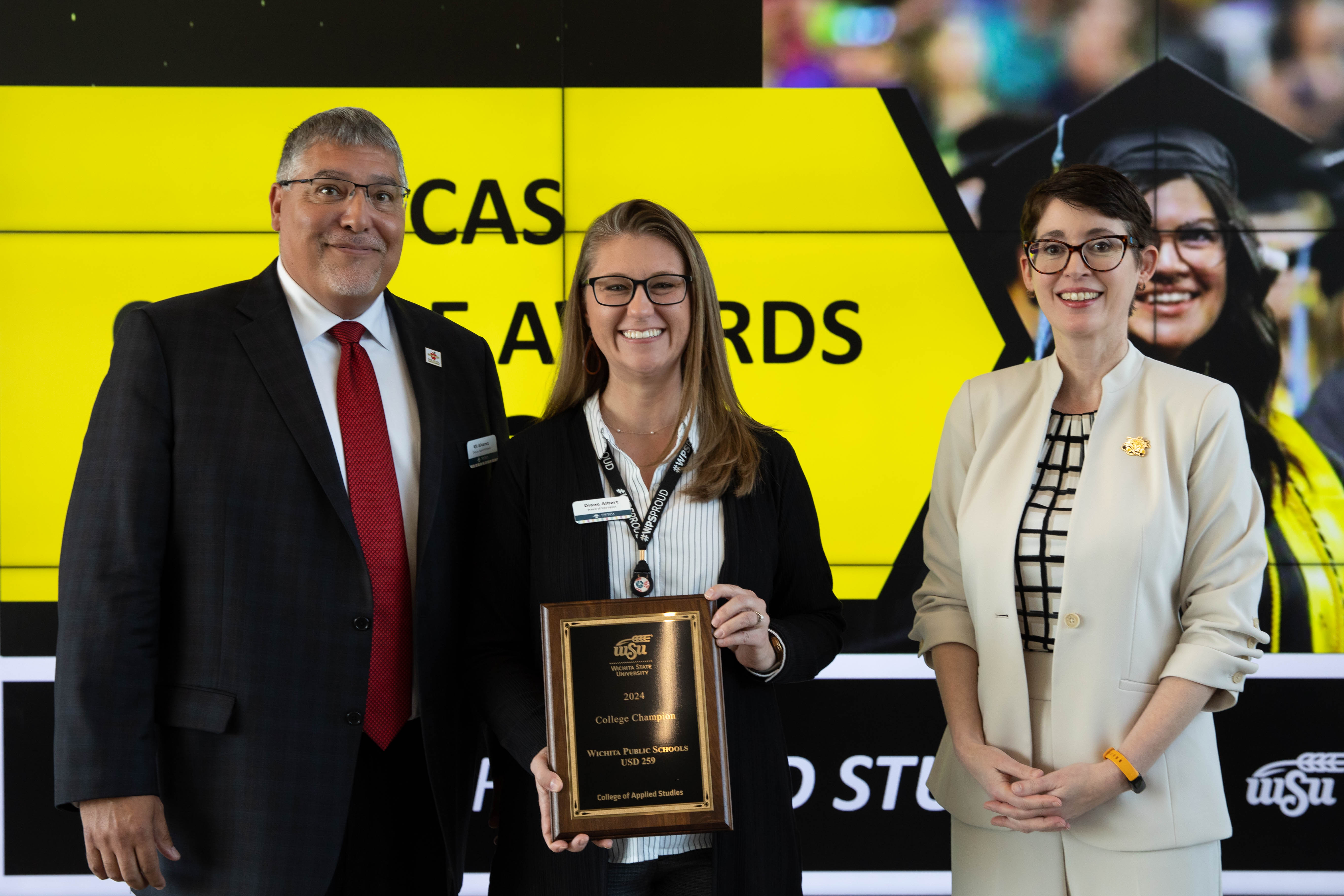 Wichita Public School’s Representatives Kelly Bielefeld and USD 259 Superintendent Diane Albert, USD 259 Board Member, with CAS Dean Jennifer Friend