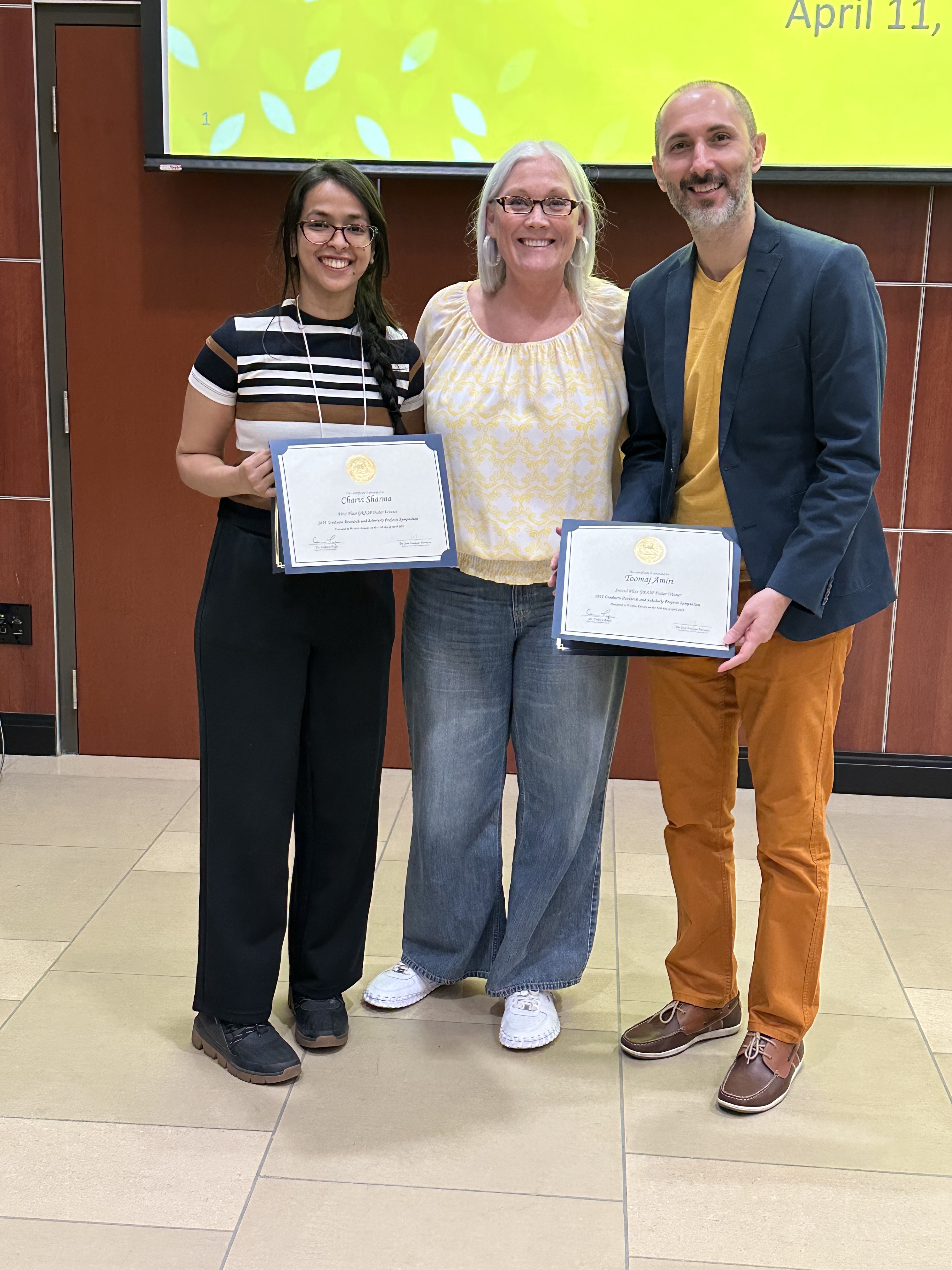 Charvi Sharma (Master's Student in Exercise Science, 1st place), Dr. Heidi Bell (HPS Department Chair, PI and Advisor) and Toomaj Amiri (Master's student in Innovation and Design, 2nd place). Charvi Sharma, Dr. Heidi Bell, Toomaj Amiri
