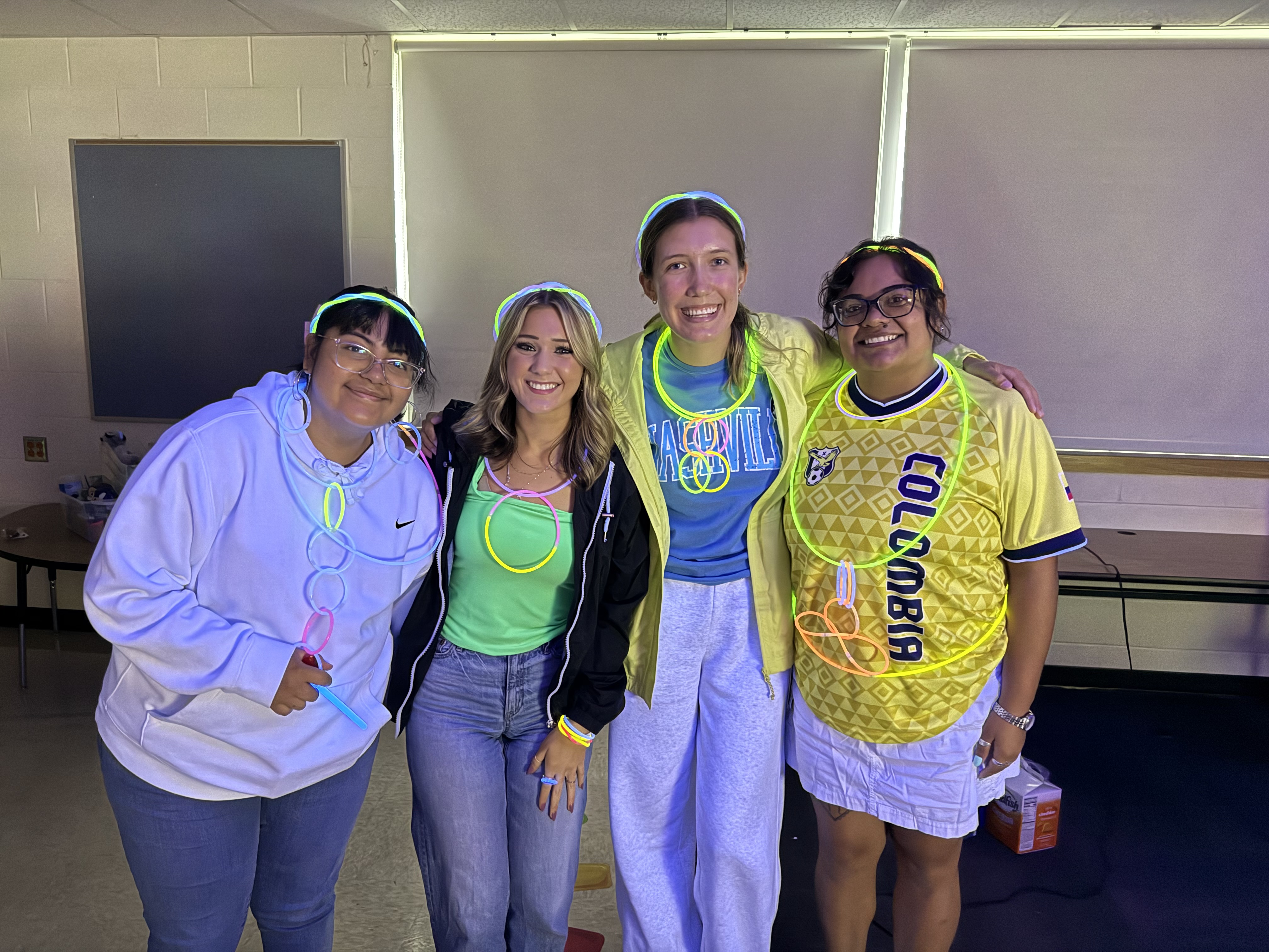 WSU Candidates CLEAR program partipating in activity with glow sticks