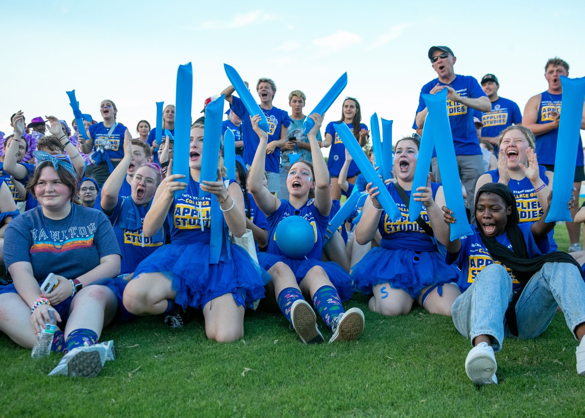 Clash of the Colleges Clash of the Colleges - CAS group photo of students cheering on the field