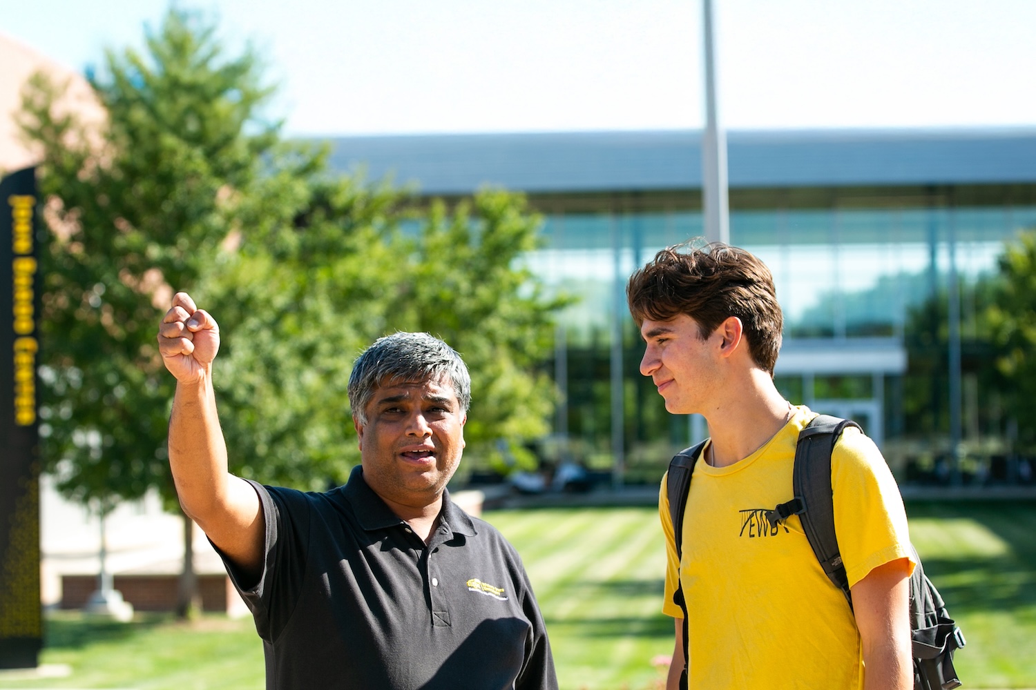 Faculty Member Talking to Student