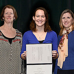 Photo of an Undergraduate receiving an award. 