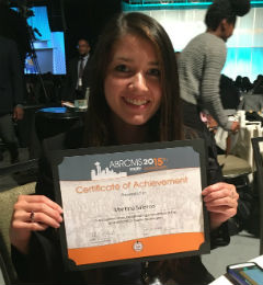 Photo of an Undergraduate receiving an award.