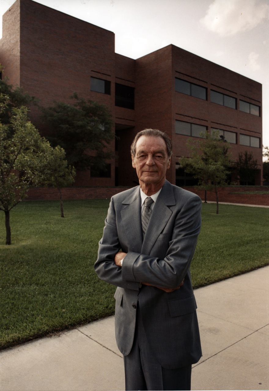 Dwane Wallace in front of the newly-built Wallace Hall in 1977.