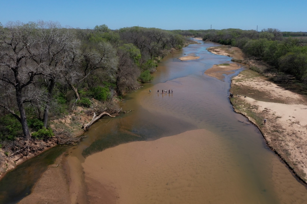 Students take samples in the Ninnescah River