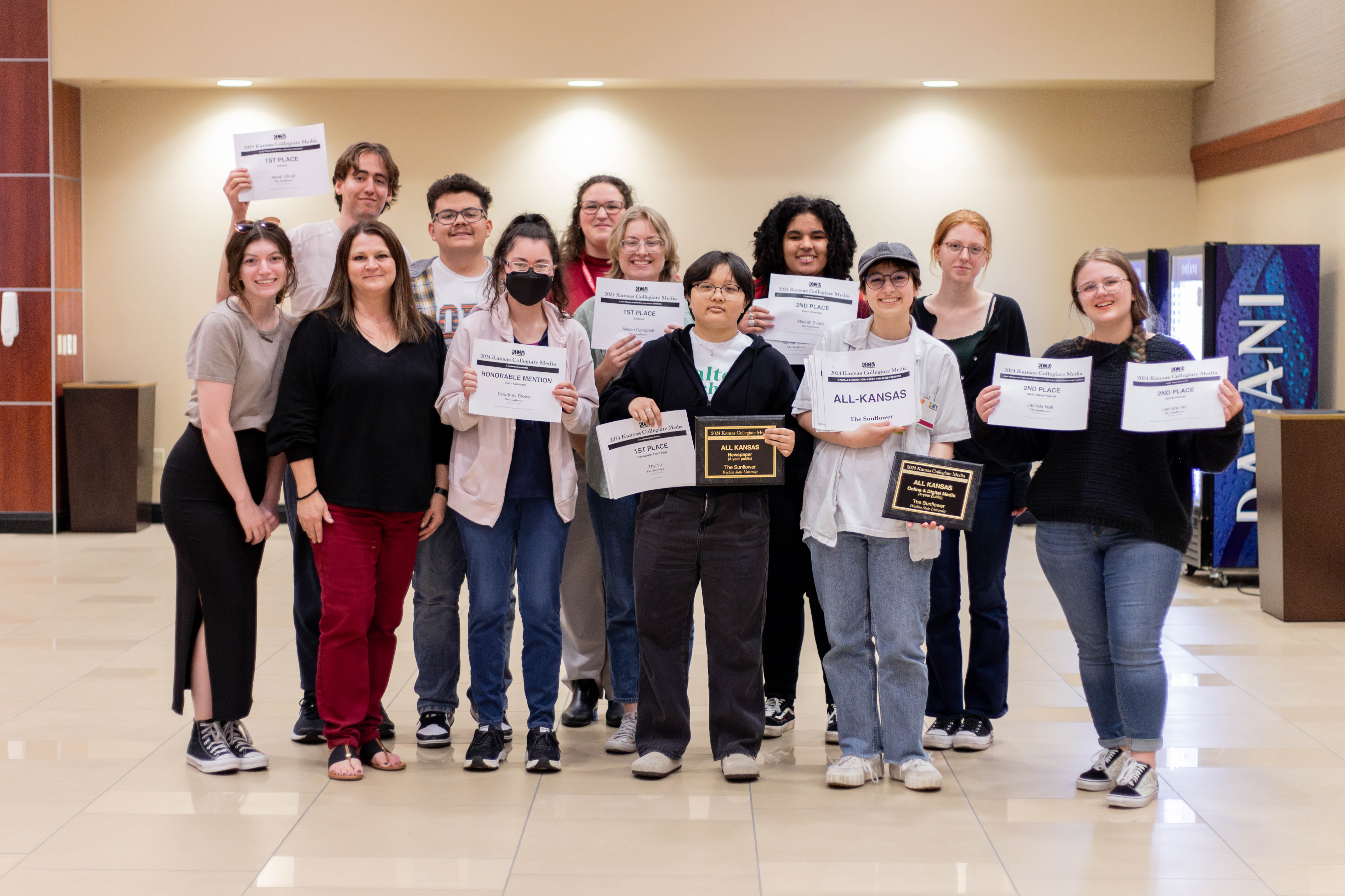 Sunflower students posing with their advisor at the KCM conference