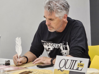Fran Connor using a quill Fran Connor writing with a quill