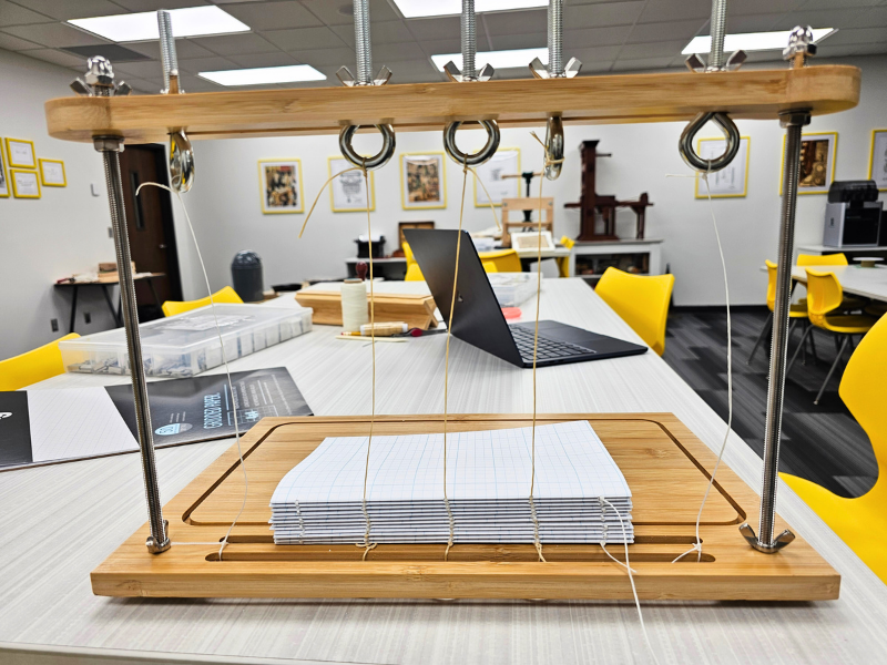 bookbinding frame with sewn textblock bookbinding frame with sewn textblock