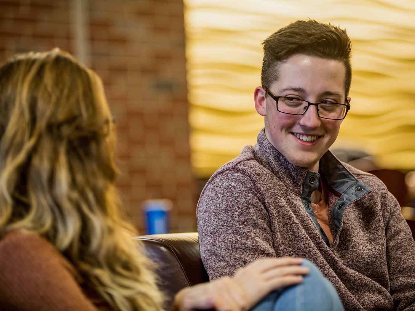 Students chatting in the Rhatigan Student Center