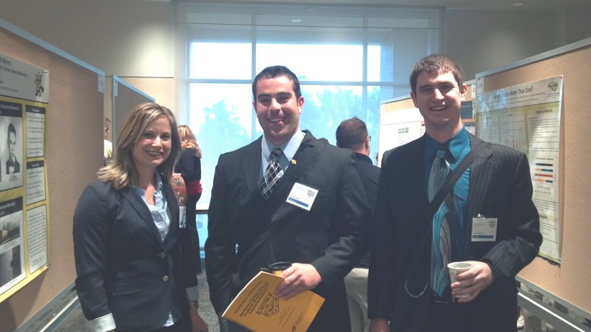 Sarah Lavallee, Jordan Poland, and Austin Rhodes presenting at the latest GRASP conference in May 2012