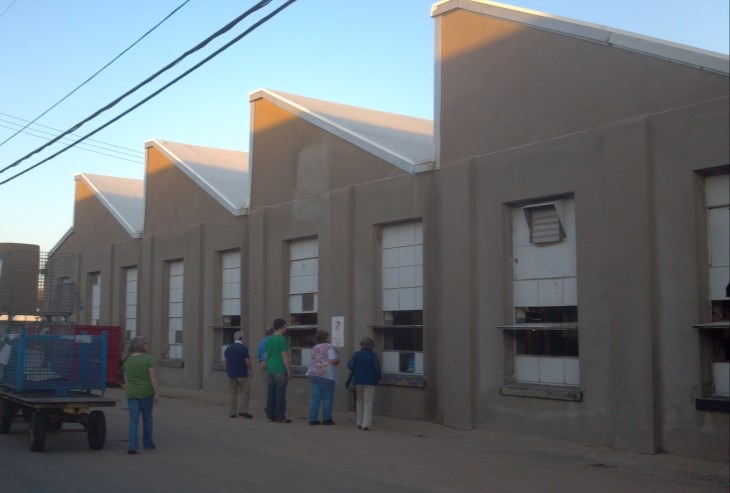 Students tour the historic Burton Stock Car plant in North Wichita