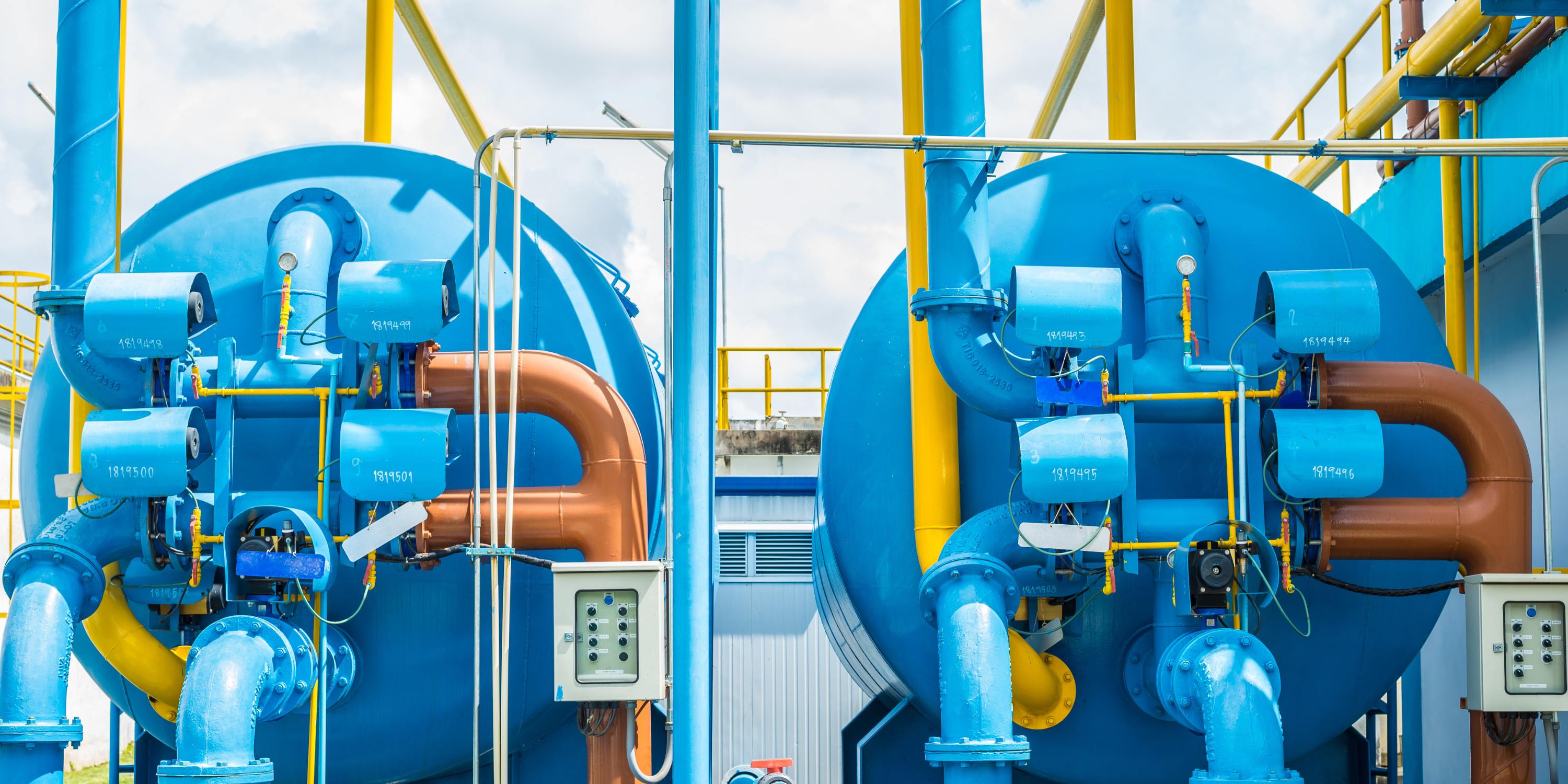 blue pipes and valves at a water treatment plant