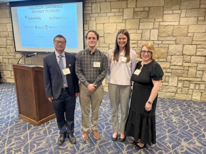 Kate Schieferecke and Travis Babcock pose for photo with Dr. Stephanie Newbold and Dr. David Guo