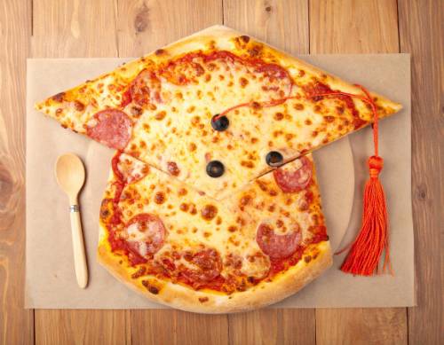AI generated image of pizza shaped like a mortarboard