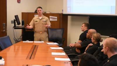 Hatfield lecturing in uniform
