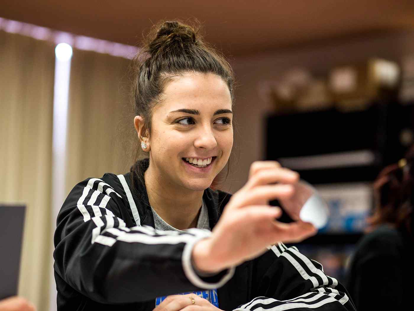 A student participates in an interactive classroom exercise