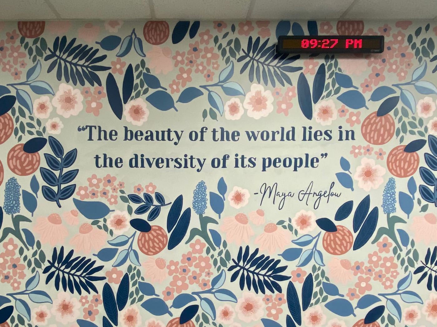 Mural with the quote "The beauty of the world lies in the diversity of its people" -Maya Angelou.