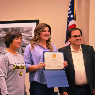 Sarah Smith receiving the Outstanding Graduate Student Award Sarah Smith receiving the Outstanding Graduate Student Award