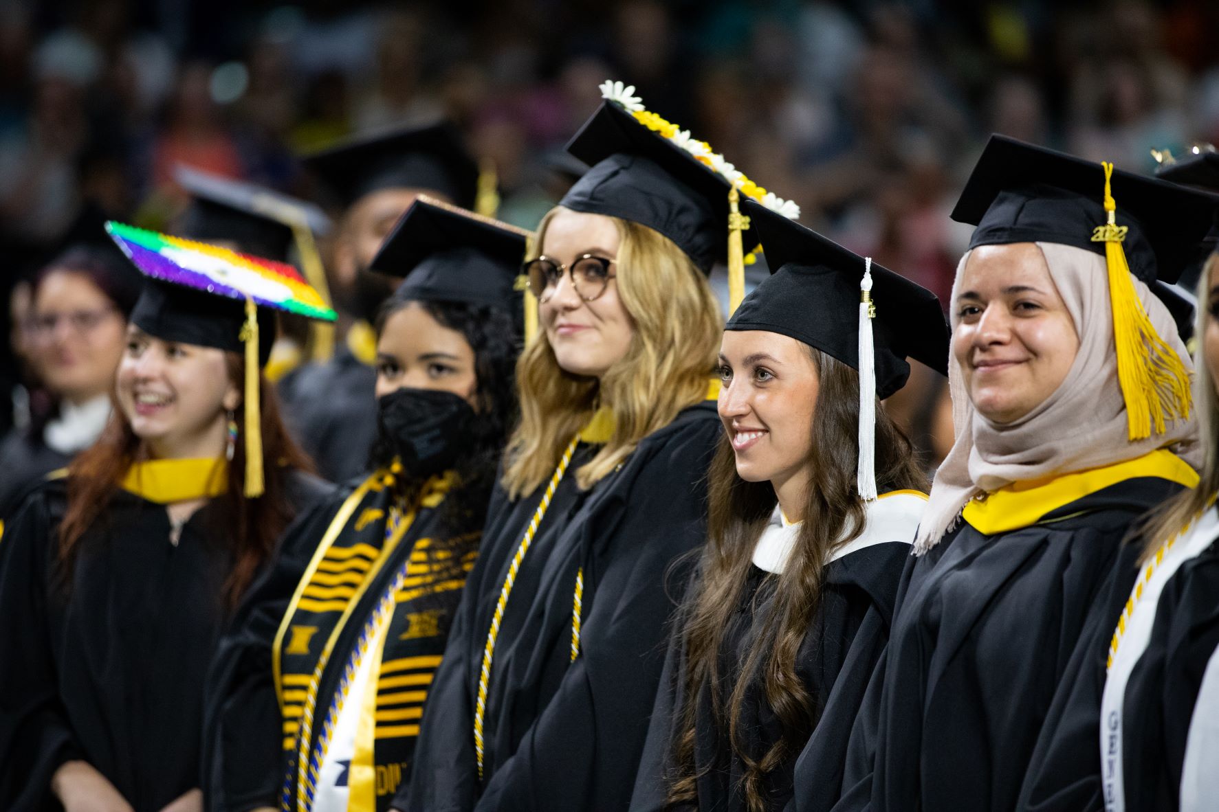 Students standing in their graduation attire