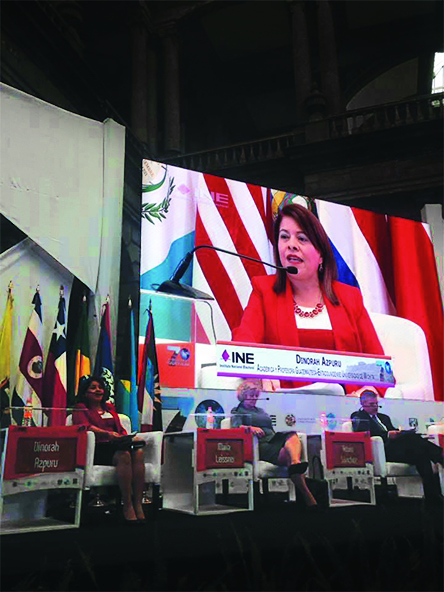Dinorah Azpuru speaks during a panel in Mexico with the U.S. Ambassador to Mexico. 