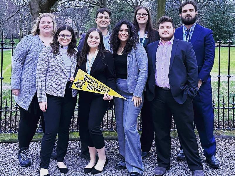 Photo of Model United Nations student team. Model UN also found success in Edinburgh.  Back row: Alex Middlewood, advisor and assistant professor of political science, Julian Pando, Devin Howell, Andrew Bobbitt. Front row: Nicole Bloomquist, Bayle Sandy, Itzia Barraza-Cordova, Jared Troxclair.