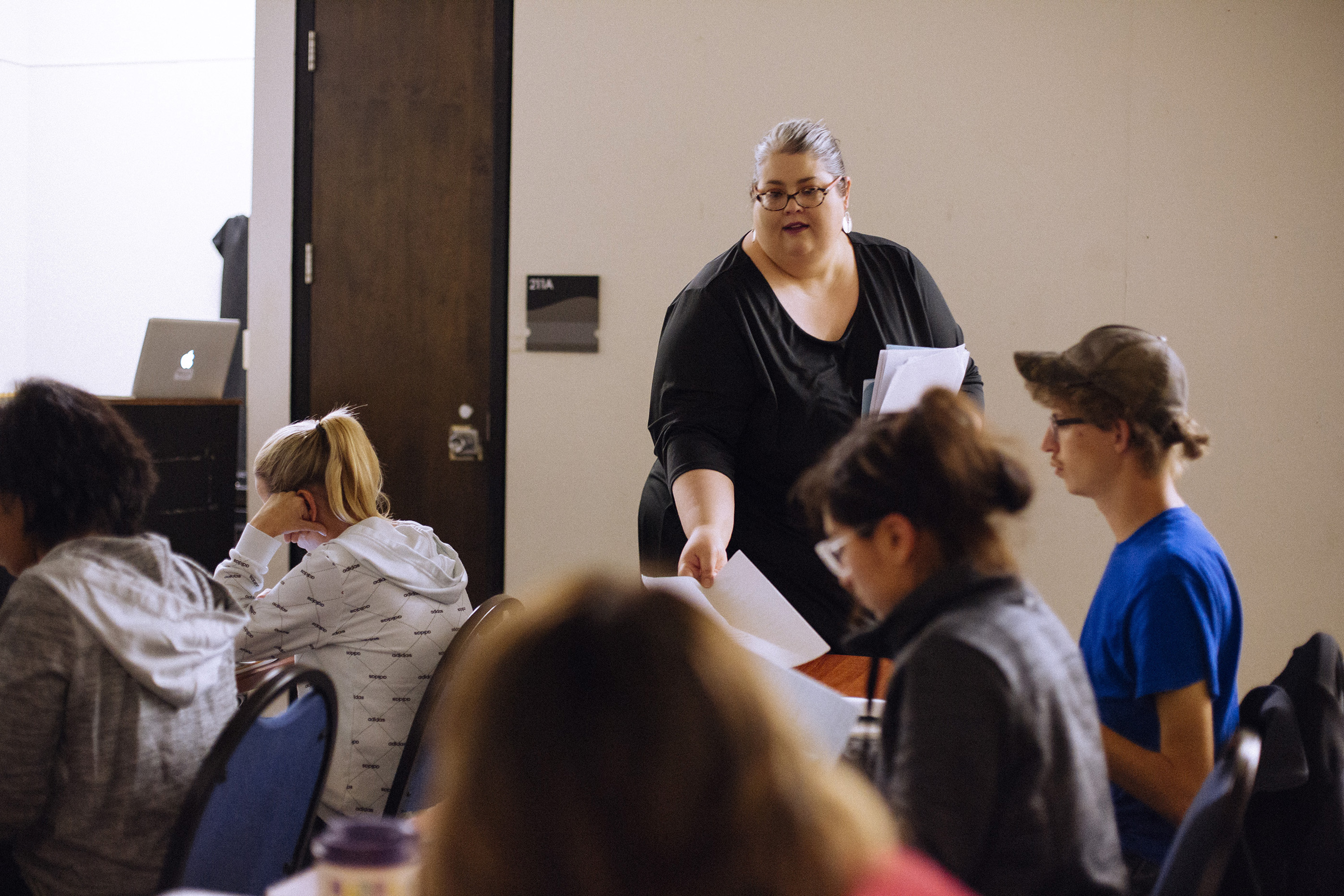 Brittany Lockard, associate professor of art history, teaching a slide-based survey course in McKnight Art Center's main lecture hall.