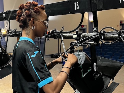 Lighting with Lena Castro lighting with a student