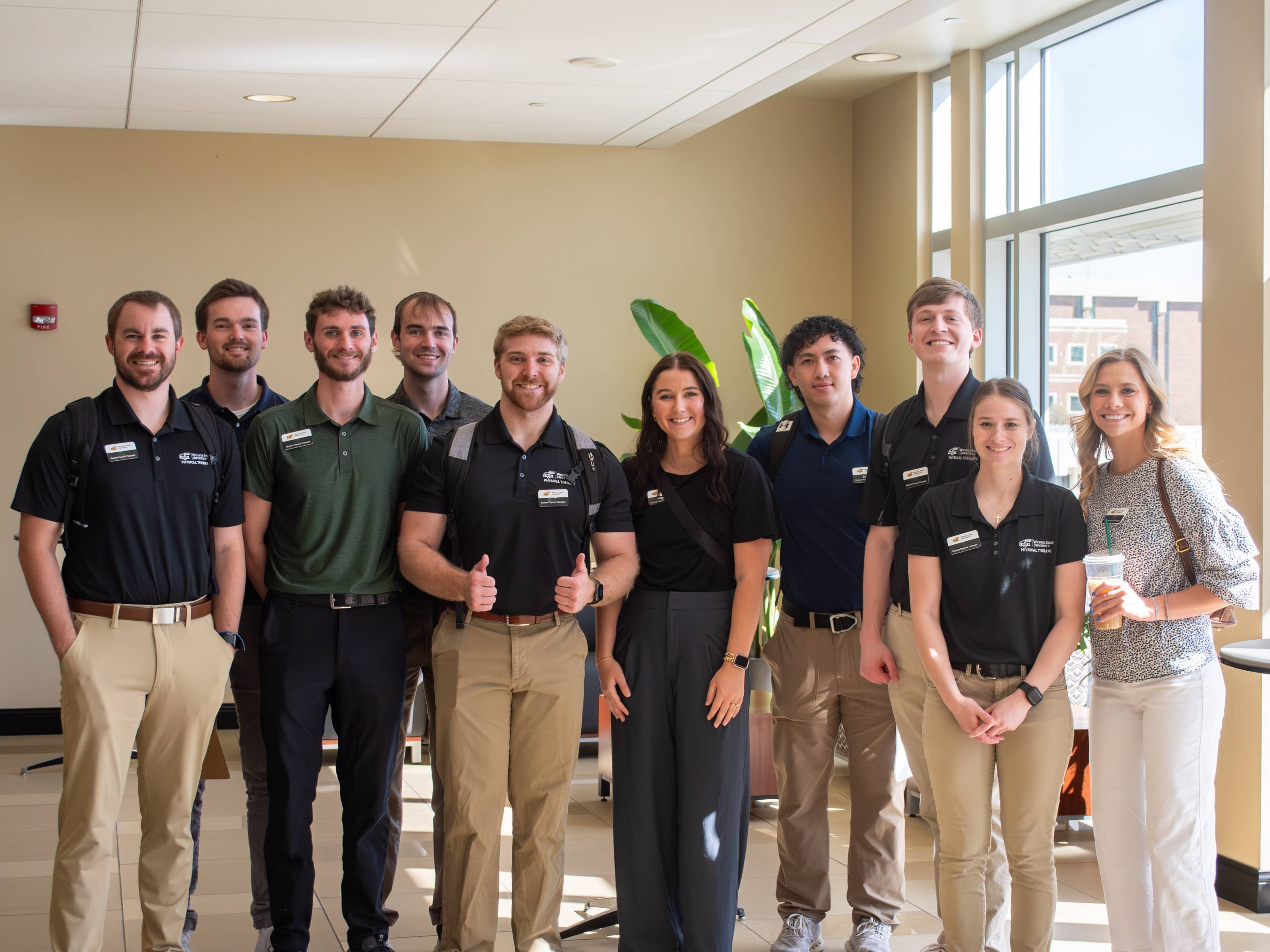 Students in a classroom observing and discussing