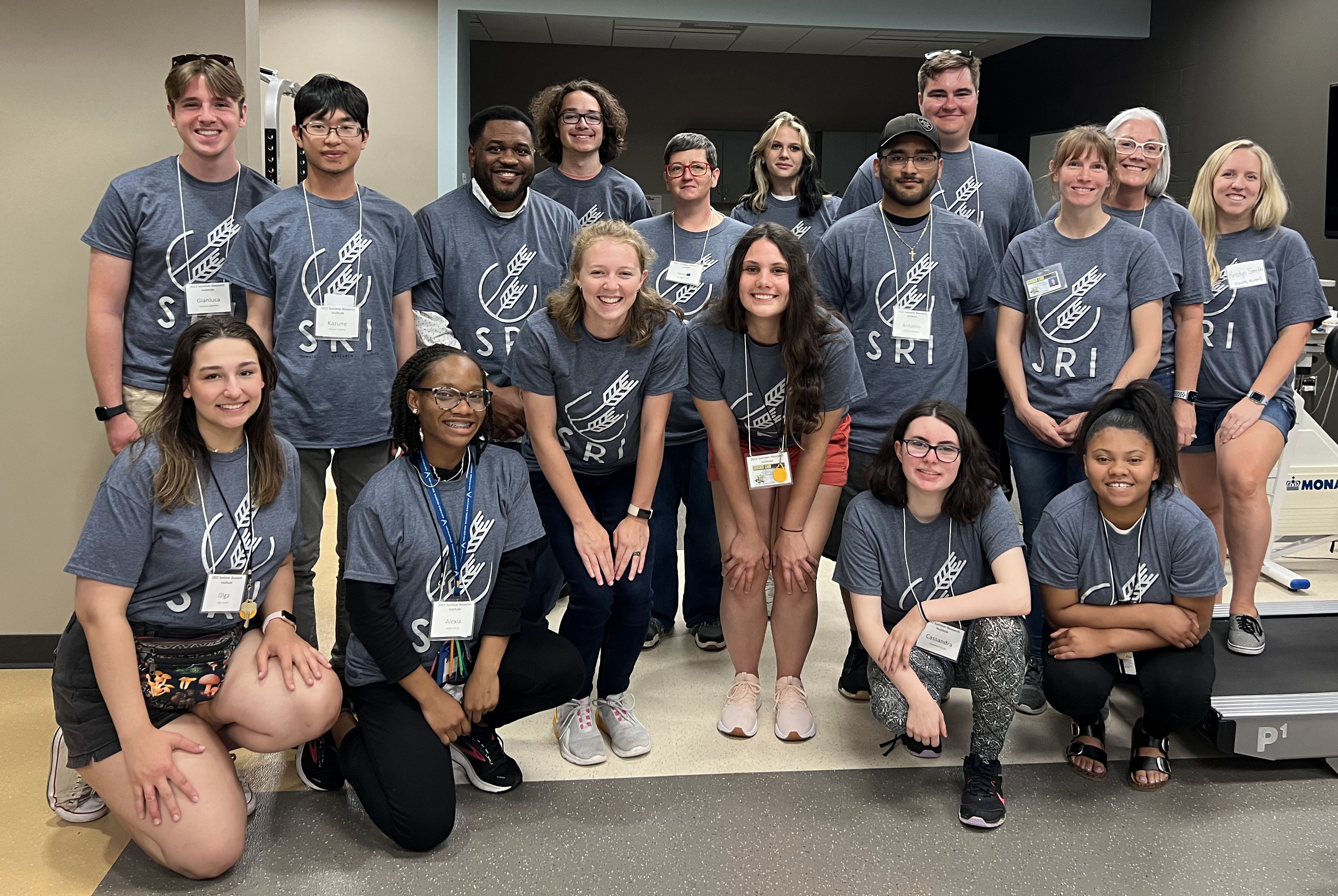 The Summer Research Institute participants, student mentors, faculty, and staff posing for a group photo.